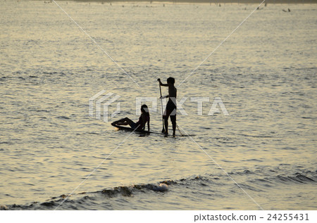 Two people in the sea 24255431