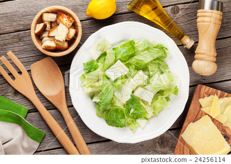 Fresh healthy caesar salad cooking 24256114
