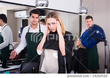 Womanl complaining on new haircut 24264588