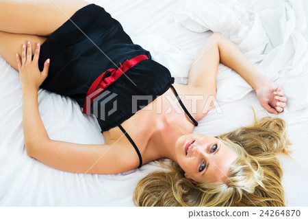 Naughty woman in lingerie indoors 24264870