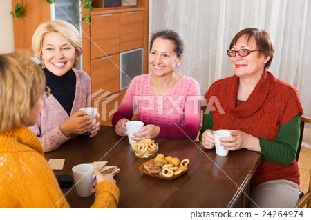 Pensioners having cup of tea 24264974