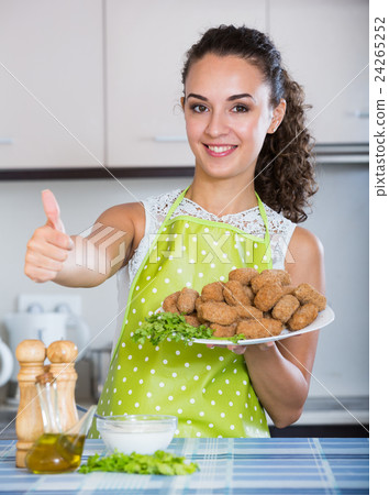 brunette with home-made croquettes brunette with home-made croquettes 24265252
