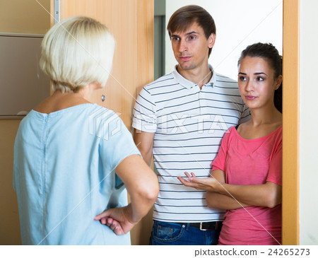 Nervous neighbors coming to old lady with complains Nervous neighbors coming to old lady with complains 24265273