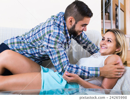 Young lovers making out at home 24265998