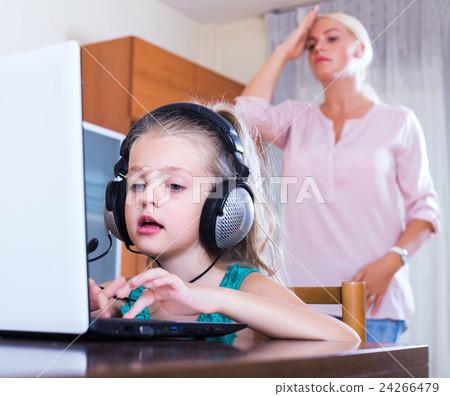 Frustrated woman catching her daughter 24266479