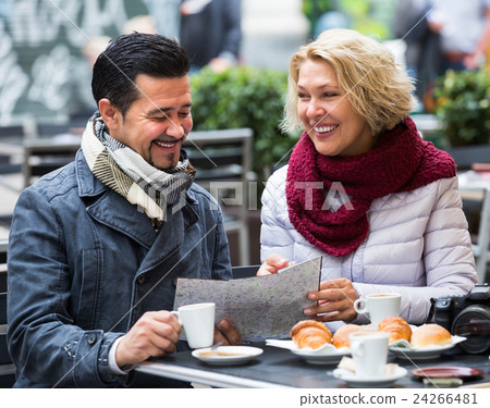 Mature couple at street cafe. 24266481