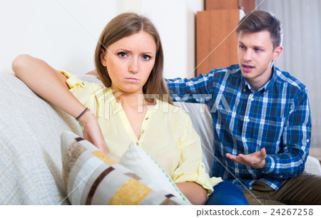 Unpleased person criticizing spouse 24267258