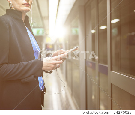 Woman Waiting Subway Terminal Transportation Concept 24270023