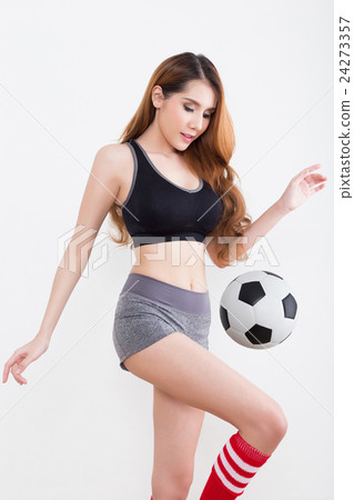 Young sexy woman with soccer ball Young sexy woman with soccer ball 24273357