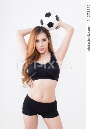 Young sexy woman with soccer ball Young sexy woman with soccer ball 24273382