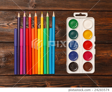 Assorted colors marker pens and pencils with Assorted colors marker pens and pencils with 24283574