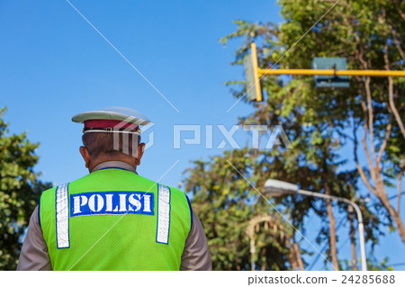 Indonesian police officer on duty Indonesian police officer on duty 24285688
