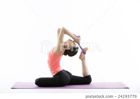 Young Asian Woman Practicing Yoga on the Mat - Isolated on White Young Asian Woman Practicing Yoga on the Mat - Isolated on White 24293779