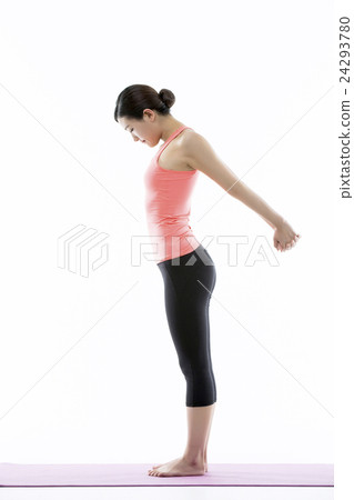 Young Asian Woman Practicing Yoga on the Mat - Isolated on White Young Asian Woman Practicing Yoga on the Mat - Isolated on White 24293780