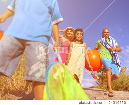 Cheerful Family Going to the Beach Cheerful Family Going to the Beach 24316350