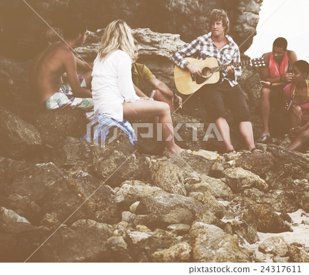 Group of friends having a Beach Party Group of friends having a Beach Party 24317611