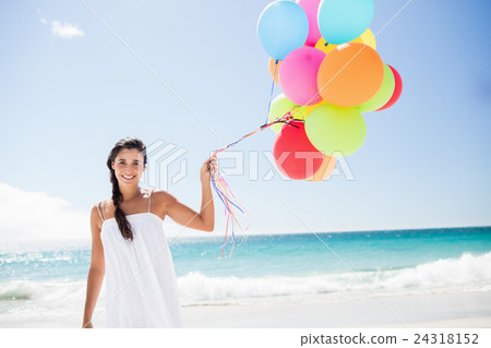 Beautiful woman holding balloon Beautiful woman holding balloon 24318152