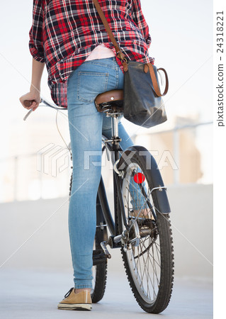 Hipster riding a bike Hipster riding a bike 24318221