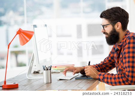 Hipster drawing on graphic tablet Hipster drawing on graphic tablet 24318253