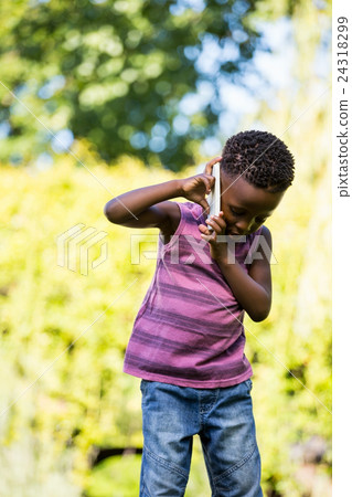 A child is having phone call A child is having phone call 24318299