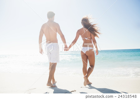 happy couple holding hands 24318548