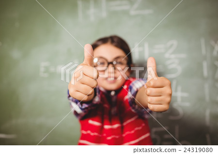 Boy standing in front of blackboard Boy standing in front of blackboard 24319080