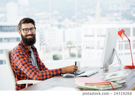 Hipster drawing on graphic tablet Hipster drawing on graphic tablet 24319268
