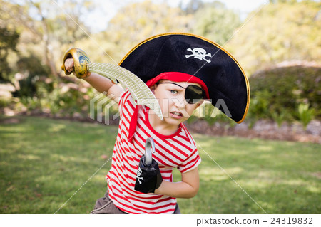 Portrait of cute boy pretending to be a pirate Portrait of cute boy pretending to be a pirate 24319832