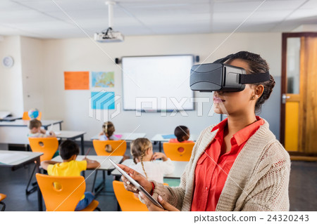 Teacher using 3D glasses Teacher using 3D glasses 24320243