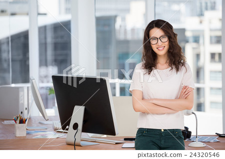 A business woman is standing A business woman is standing 24320546