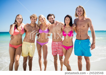Friends having fun at the beach Friends having fun at the beach 24320548