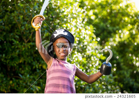 Boy is dressing up as a pirate 24321605