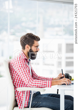Thoughtful hipster man Thoughtful hipster man 24321703