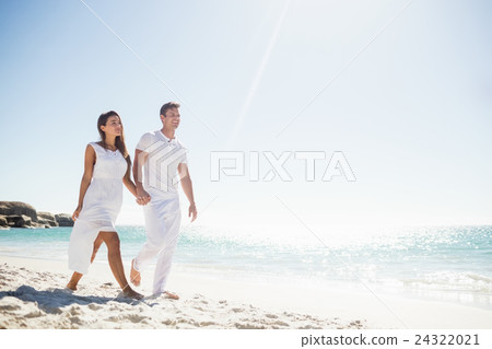 Cute couple holding hands Cute couple holding hands 24322021