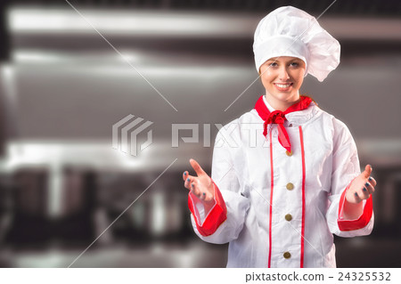 Composite image of pretty chef standing with hands out Composite image of pretty chef standing with hands out 24325532