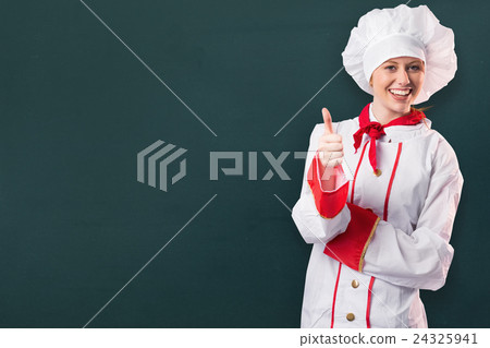 Composite image of pretty chef showing thumbs up 24325941
