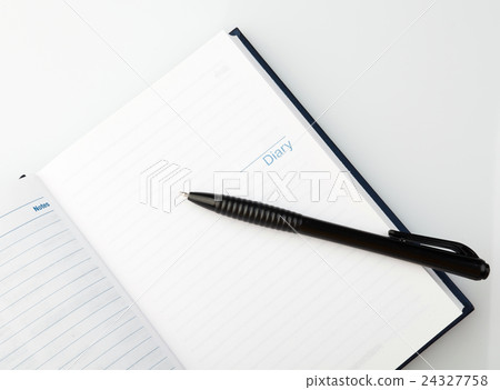 Open notebook with pen Open notebook with pen 24327758