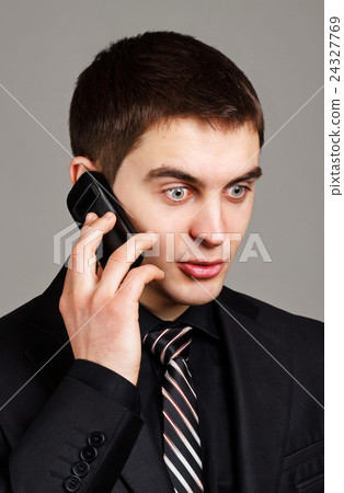 man talking on phone man talking on phone 24327769