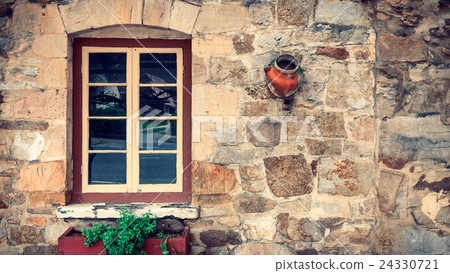Old house window with flower pots in Hahndorf 24330721