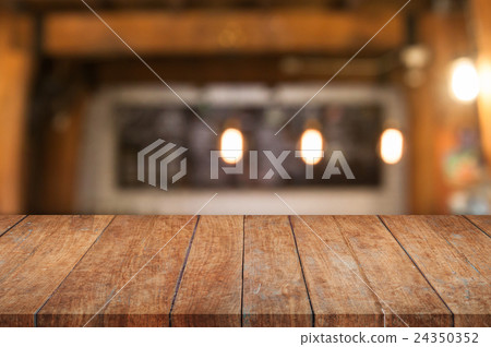 Brown wooden table top with coffee shop Brown wooden table top with coffee shop 24350352