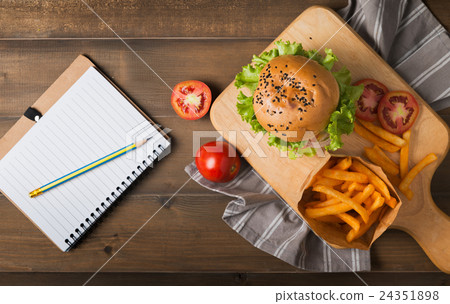 Homemade hamburger with french fries and notebook 24351898