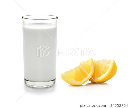 Glass of milk and Half lemon fruit Glass of milk and Half lemon fruit 24352764