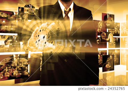 businessman holding a touch screen interface businessman holding a touch screen interface 24352765