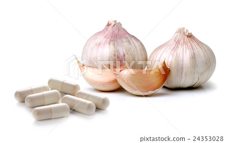 garlic and pills capsule isolated garlic and pills capsule isolated 24353028