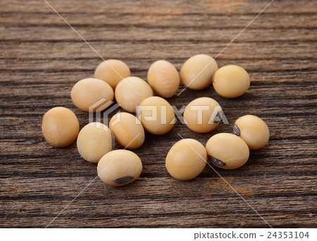 Soy beans on wooden background 24353104