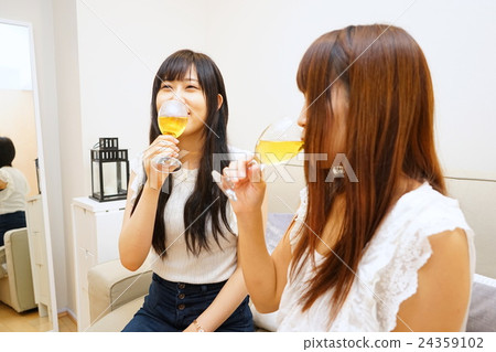Japanese young woman taking home parties at home girls' party Japanese young woman taking home parties at home girls' party 24359102