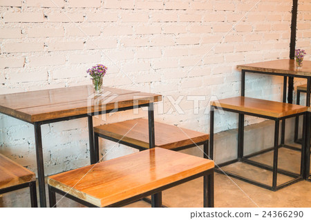 Room interior white brick wall with wooden table 24366290