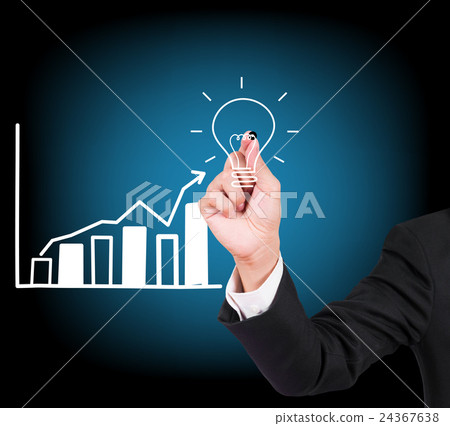 Businessman hand writing and drawing light bulb Businessman hand writing and drawing light bulb 24367638