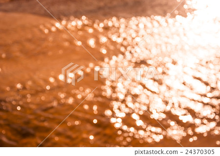 out of focus bokeh background of water with sun 24370305