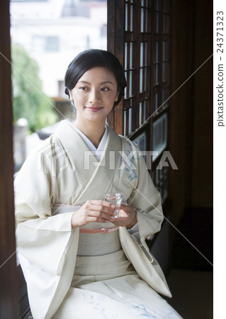 Sake in Japanese clothes 24371323